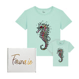 Mint green t-shirt with a colorful seahorse design and a smaller matching t-shirt, both featuring the Fauna.ie brand.