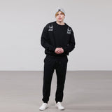 Organic Cotton Unisex Tracksuit | Silver swallows on black - fauna.ie