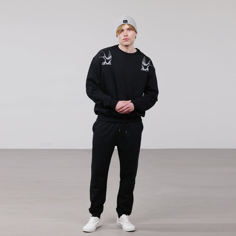 Organic Cotton Unisex Tracksuit | Silver swallows on black - fauna.ie
