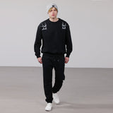 Organic Cotton Unisex Tracksuit | Silver swallows on black - fauna.ie